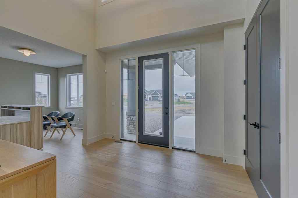 MLS® A2215484 - 703 Green Haven Place  in Green Haven Estates Rural Foothills County, Residential