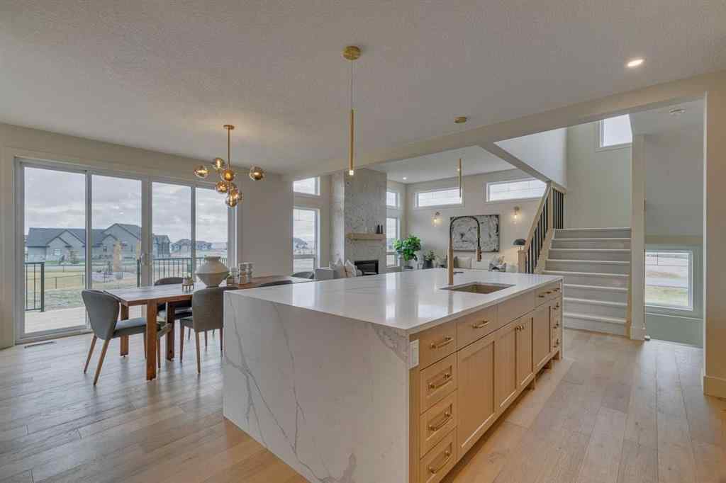 MLS® A2215484 - 703 Green Haven Place  in Green Haven Estates Rural Foothills County, Residential