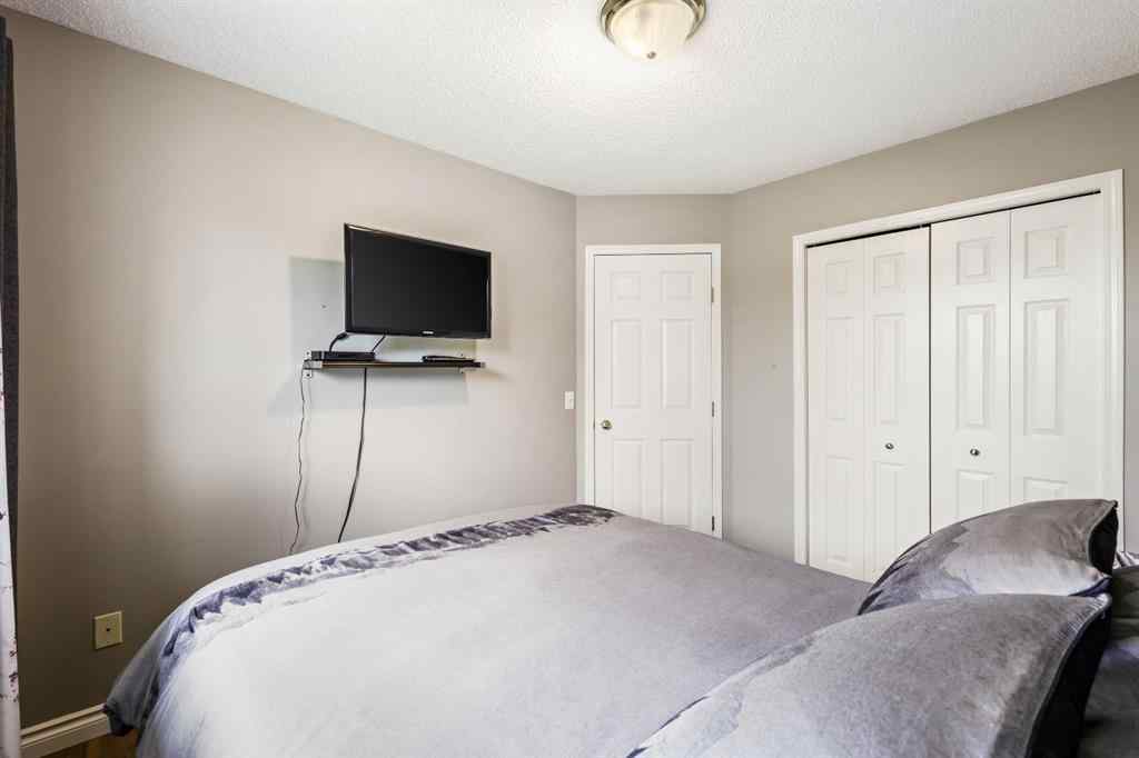 MLS® A2215495 - Unit #200 243121 16 Street E in NONE Rural Foothills County, Residential