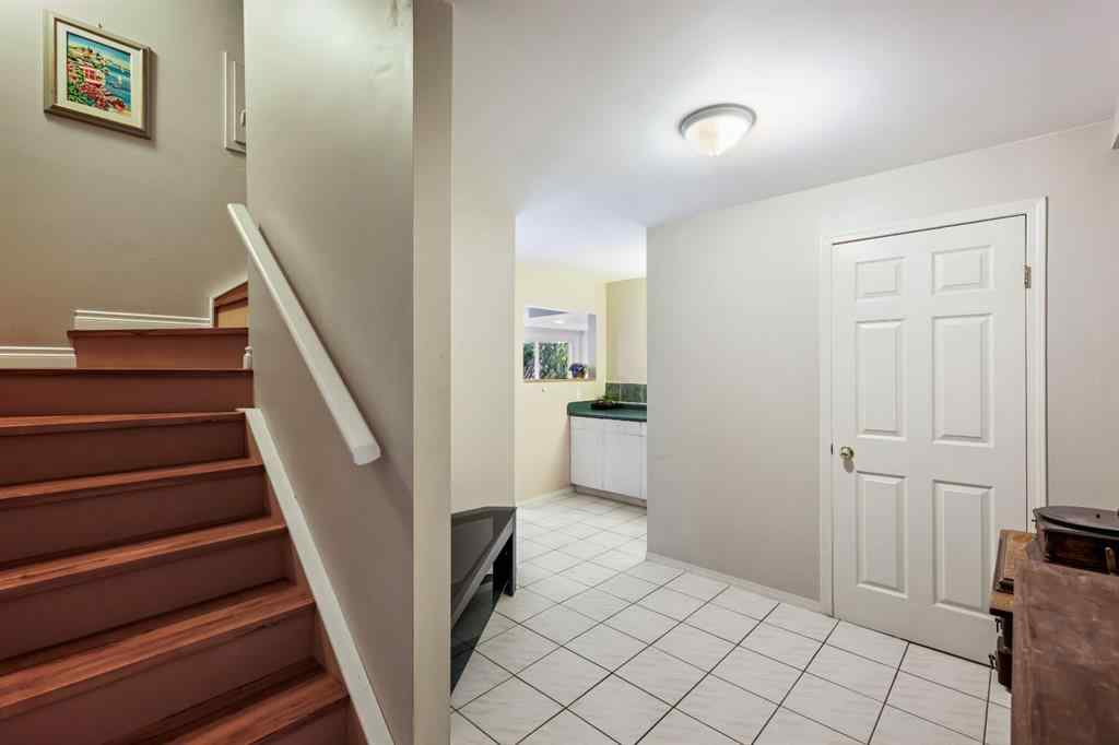 MLS® A2215495 - Unit #200 243121 16 Street E in NONE Rural Foothills County, Residential