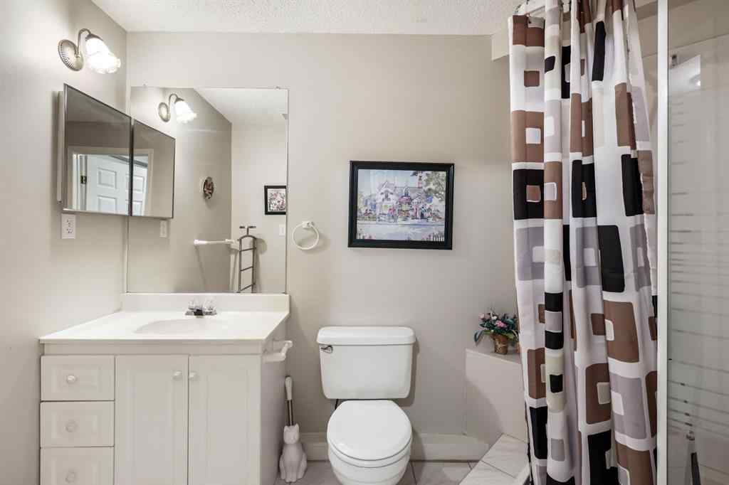 MLS® A2215495 - Unit #200 243121 16 Street E in NONE Rural Foothills County, Residential
