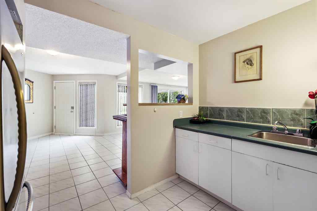 MLS® A2215495 - Unit #200 243121 16 Street E in NONE Rural Foothills County, Residential
