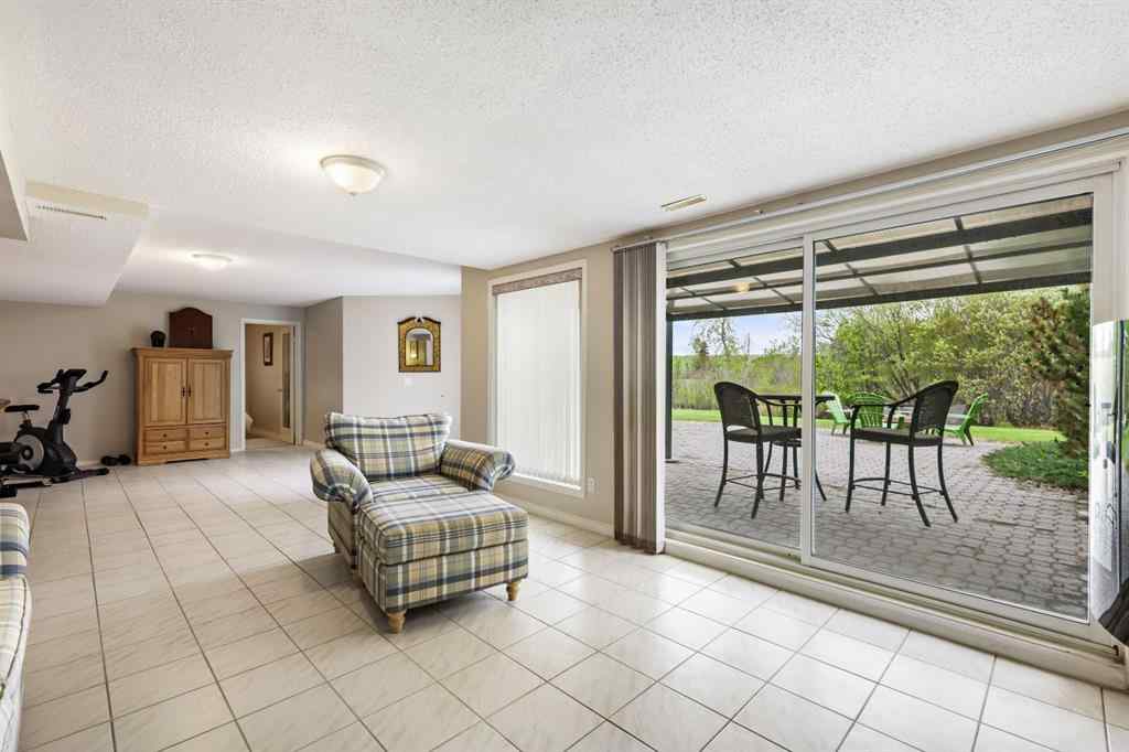 MLS® A2215495 - Unit #200 243121 16 Street E in NONE Rural Foothills County, Residential