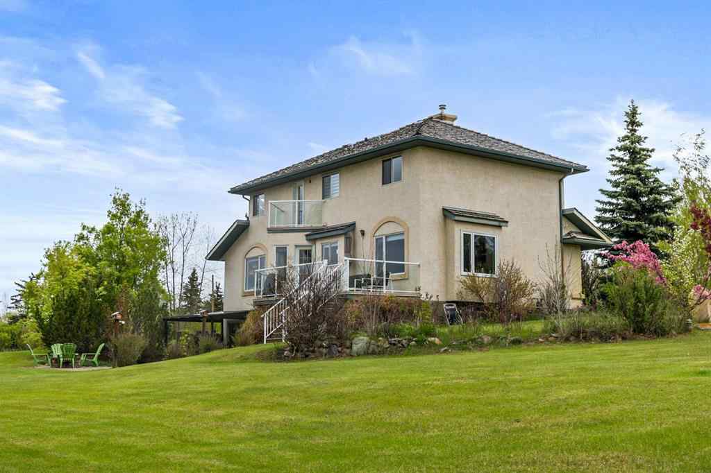 MLS® A2215495 - Unit #200 243121 16 Street E in NONE Rural Foothills County, Residential