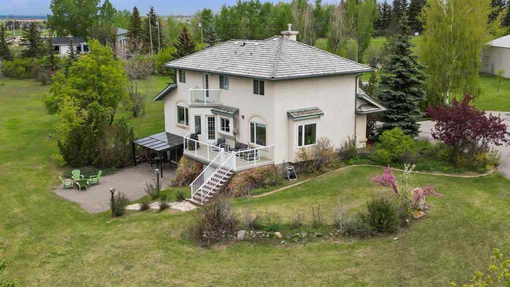 MLS® A2215495 - Unit #200 243121 16 Street E in NONE Rural Foothills County, Residential
