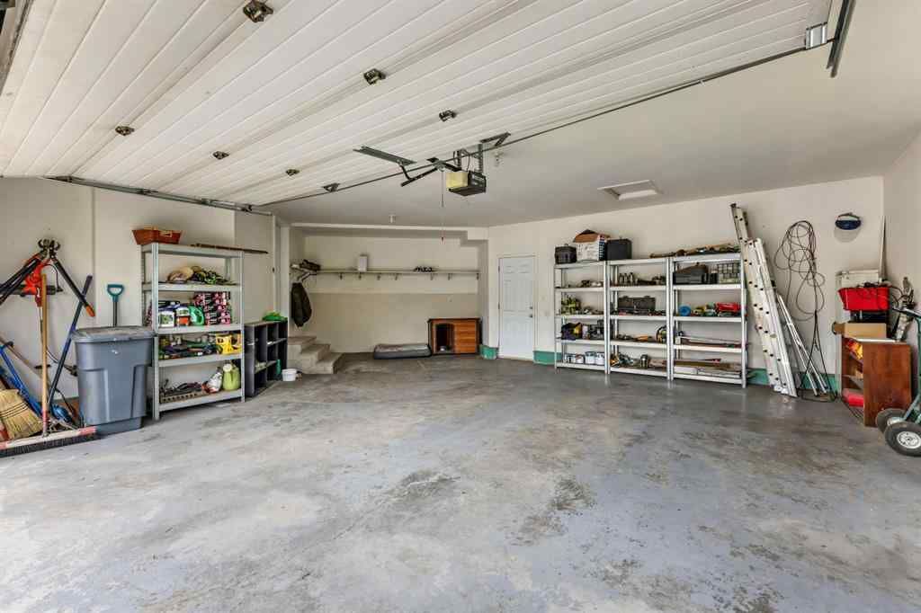 MLS® A2215495 - Unit #200 243121 16 Street E in NONE Rural Foothills County, Residential