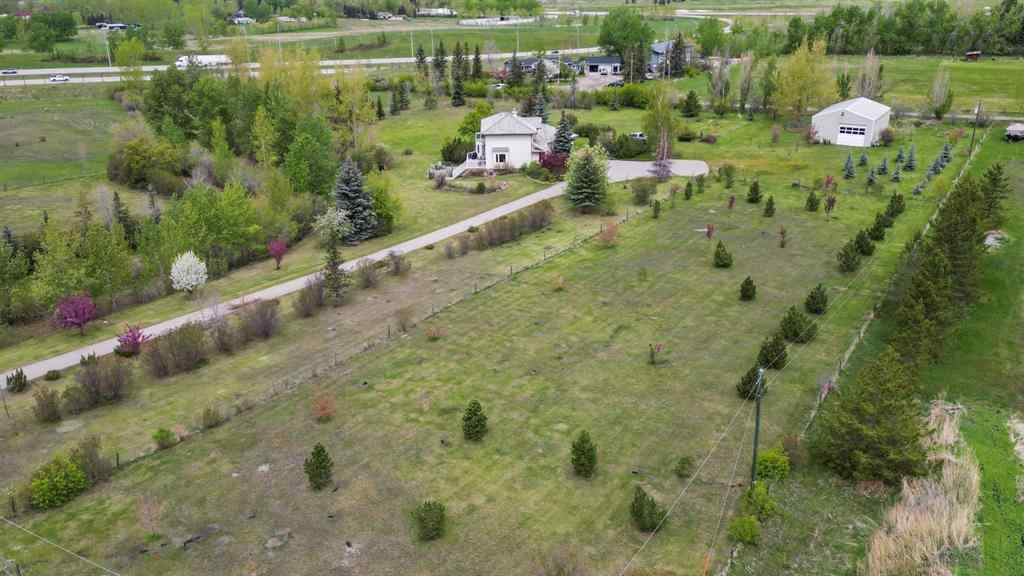 MLS® A2215495 - Unit #200 243121 16 Street E in NONE Rural Foothills County, Residential