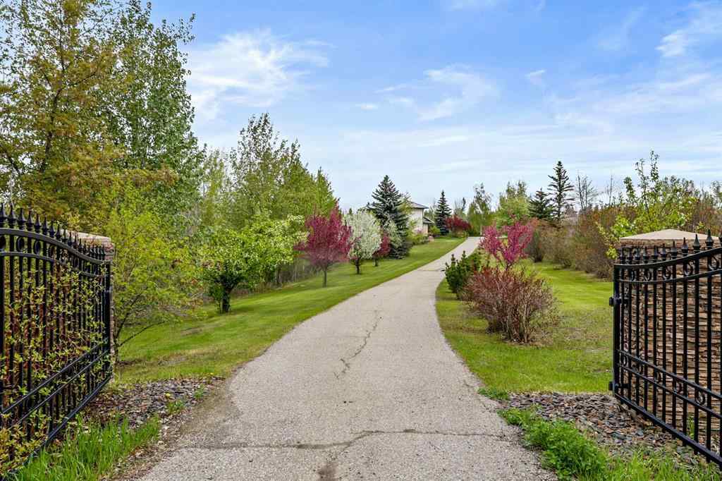 MLS® A2215495 - Unit #200 243121 16 Street E in NONE Rural Foothills County, Residential
