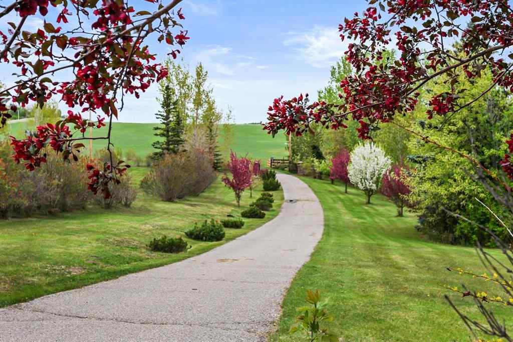 MLS® A2215495 - Unit #200 243121 16 Street E in NONE Rural Foothills County, Residential