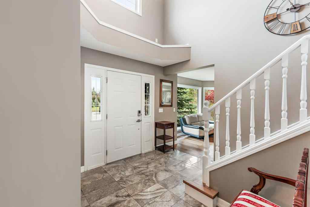 MLS® A2215495 - Unit #200 243121 16 Street E in NONE Rural Foothills County, Residential