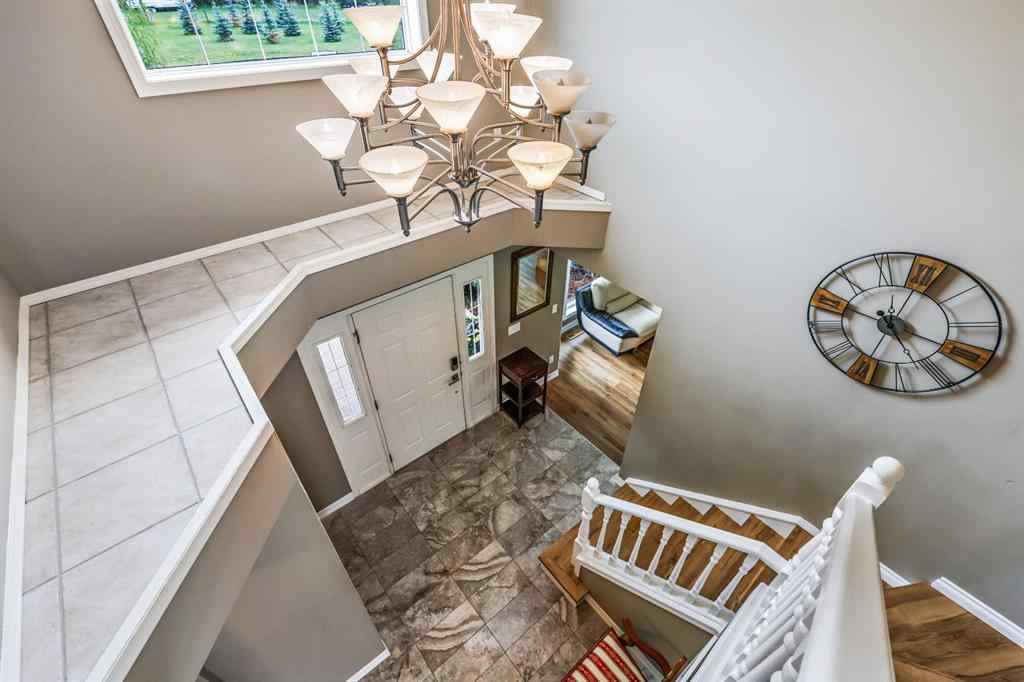 MLS® A2215495 - Unit #200 243121 16 Street E in NONE Rural Foothills County, Residential