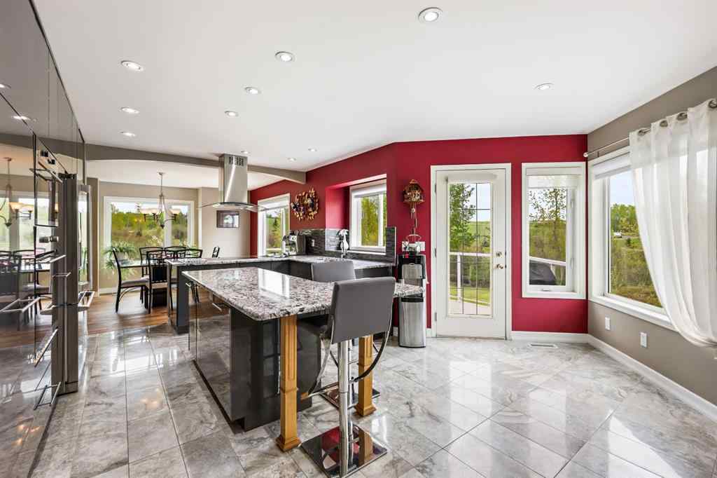 MLS® A2215495 - Unit #200 243121 16 Street E in NONE Rural Foothills County, Residential