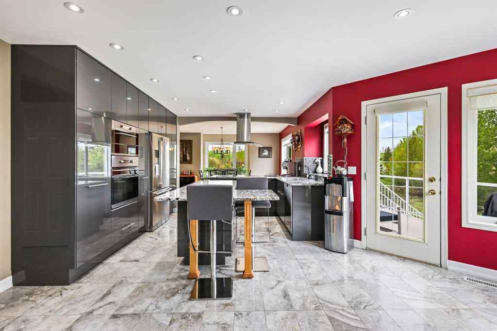 MLS® A2215495 - Unit #200 243121 16 Street E in NONE Rural Foothills County, Residential