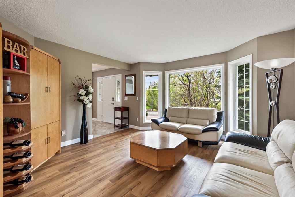 MLS® A2215495 - Unit #200 243121 16 Street E in NONE Rural Foothills County, Residential