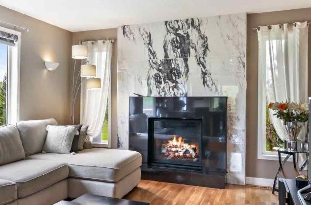 MLS® A2215495 - Unit #200 243121 16 Street E in NONE Rural Foothills County, Residential