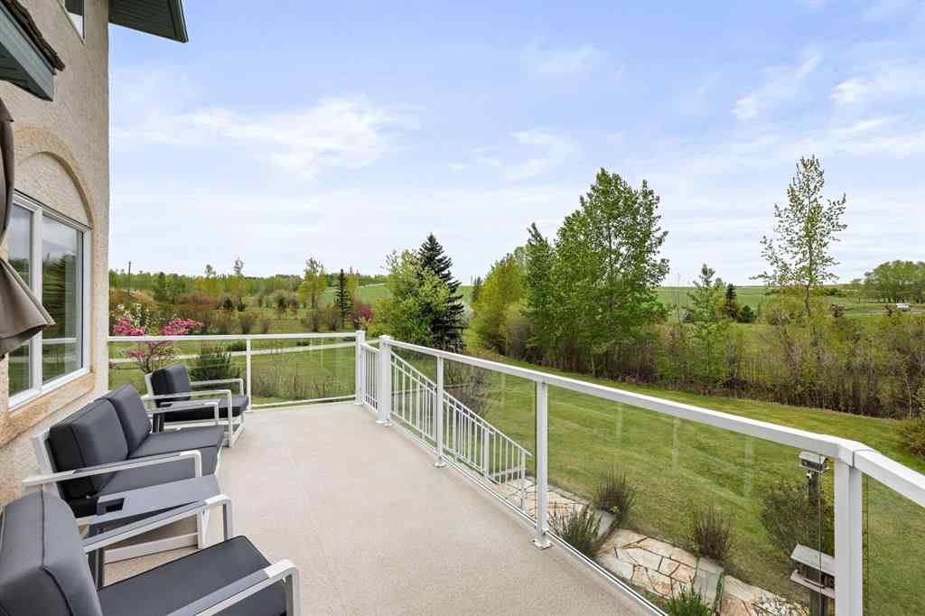 MLS® A2215495 - Unit #200 243121 16 Street E in NONE Rural Foothills County, Residential