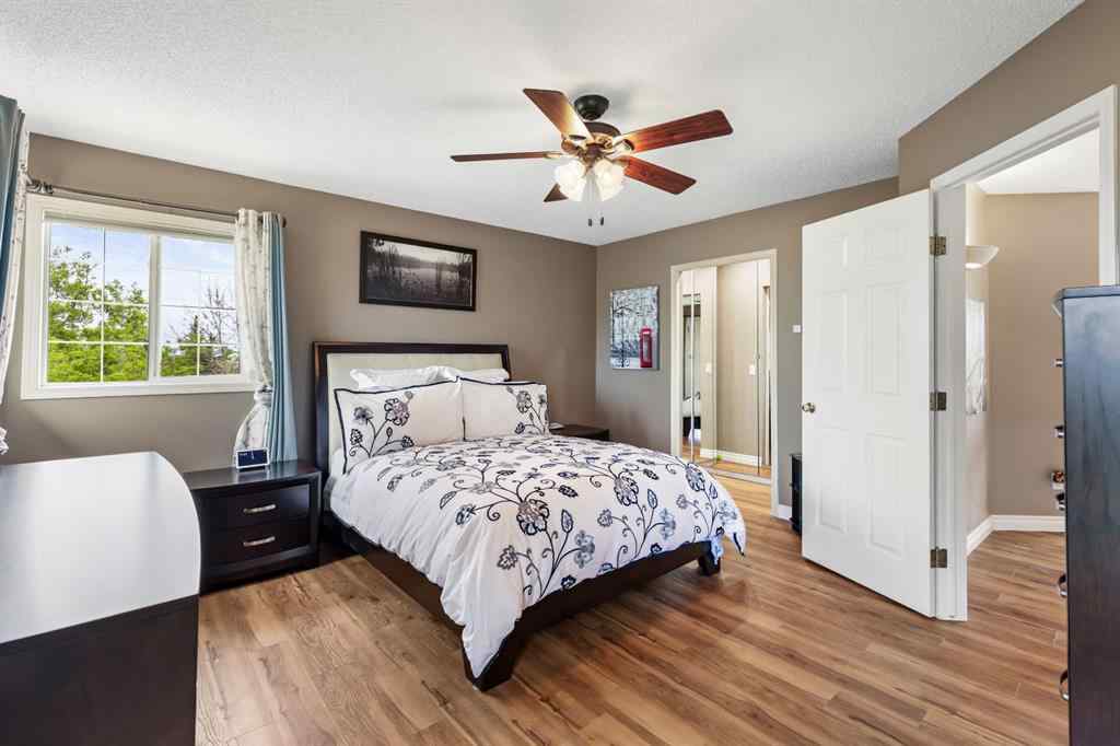 MLS® A2215495 - Unit #200 243121 16 Street E in NONE Rural Foothills County, Residential