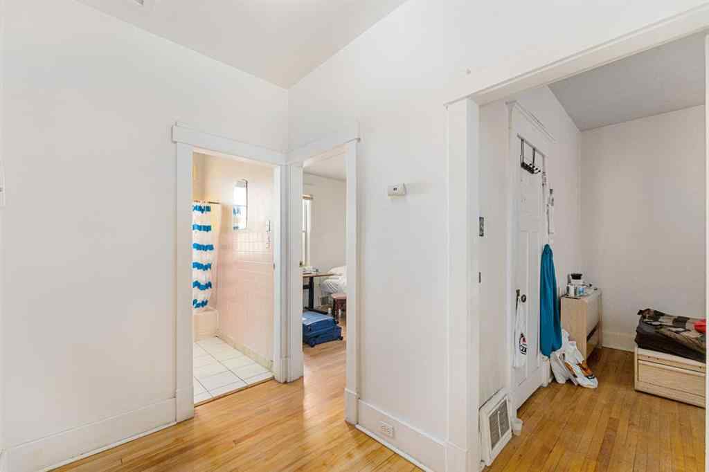 MLS® A2215530 - 216 15 Avenue NW in Crescent Heights Calgary, Residential