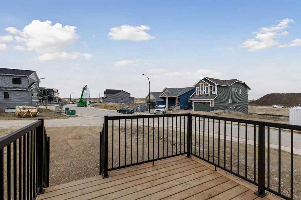 MLS® A2215565 - 143 Herron Walk NE in Livingston Calgary, Residential