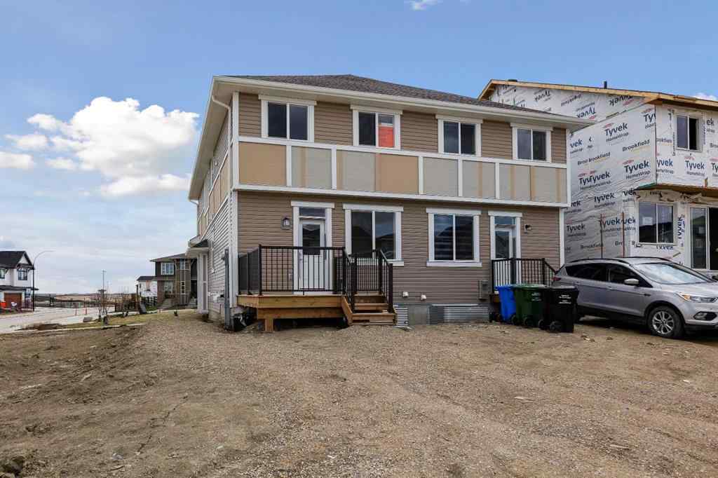 MLS® A2215565 - 143 Herron Walk NE in Livingston Calgary, Residential