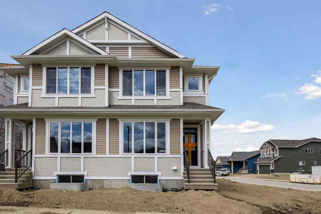 MLS® A2215565 - 143 Herron Walk NE in Livingston Calgary, Residential