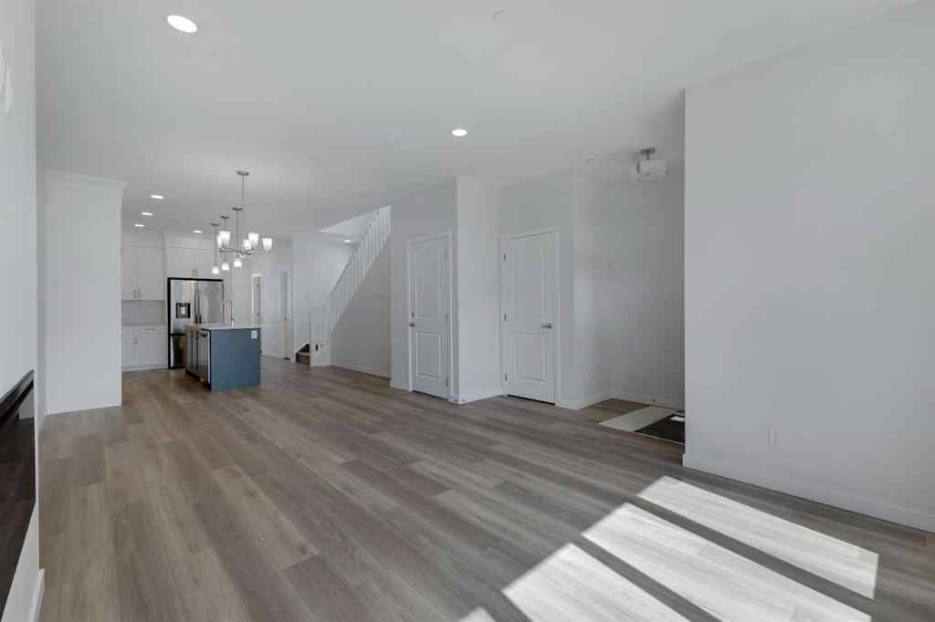 MLS® A2215565 - 143 Herron Walk NE in Livingston Calgary, Residential