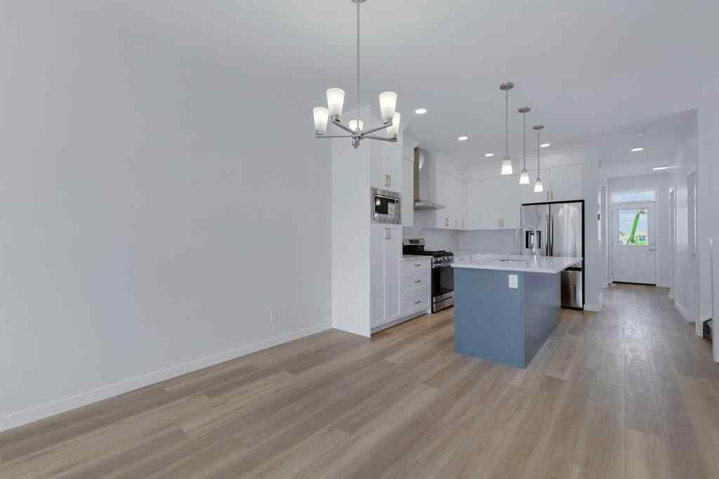 MLS® A2215565 - 143 Herron Walk NE in Livingston Calgary, Residential