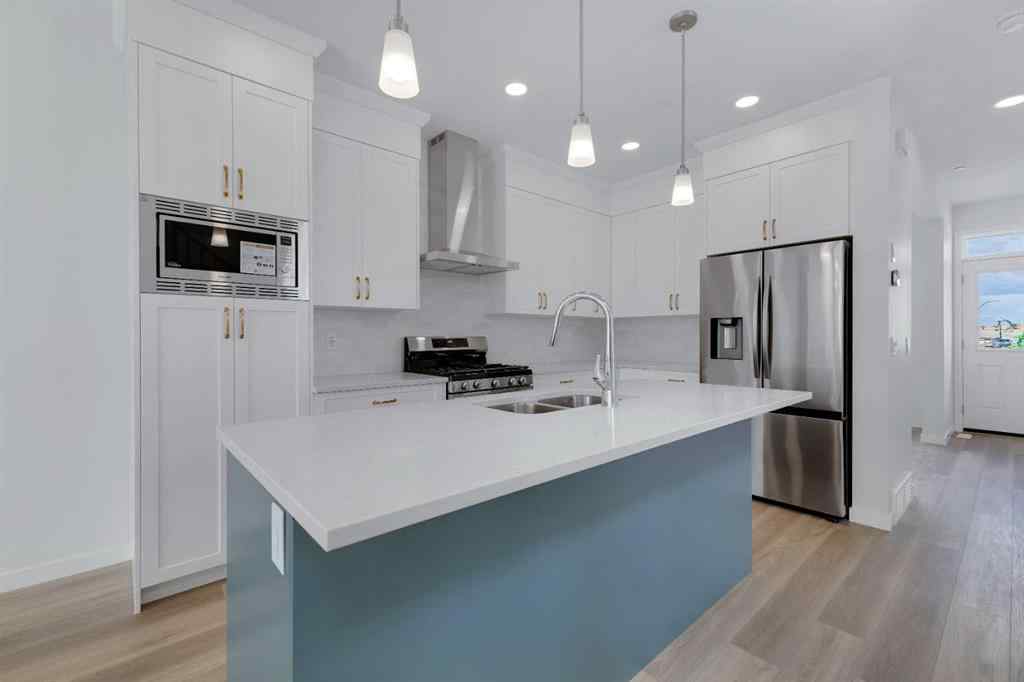 MLS® A2215565 - 143 Herron Walk NE in Livingston Calgary, Residential
