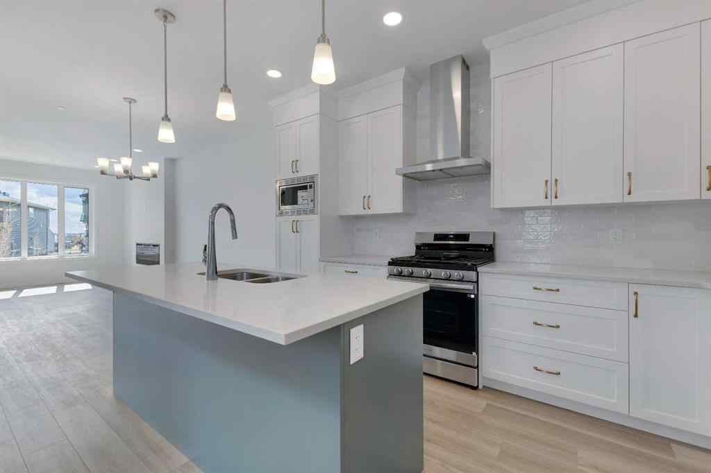 MLS® A2215565 - 143 Herron Walk NE in Livingston Calgary, Residential