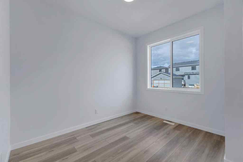 MLS® A2215565 - 143 Herron Walk NE in Livingston Calgary, Residential