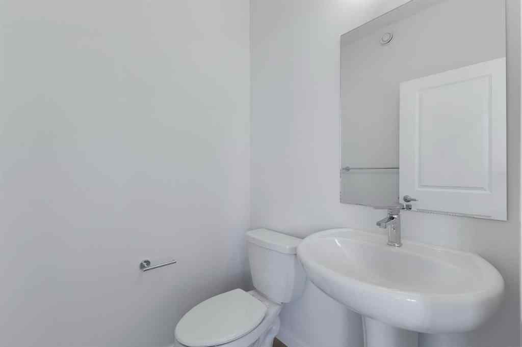 MLS® A2215565 - 143 Herron Walk NE in Livingston Calgary, Residential