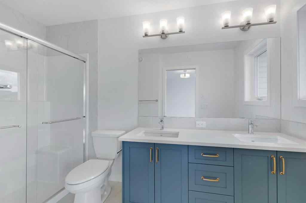 MLS® A2215565 - 143 Herron Walk NE in Livingston Calgary, Residential