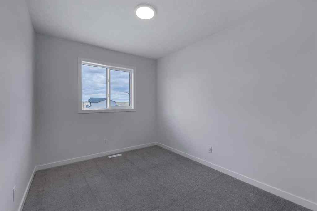 MLS® A2215565 - 143 Herron Walk NE in Livingston Calgary, Residential