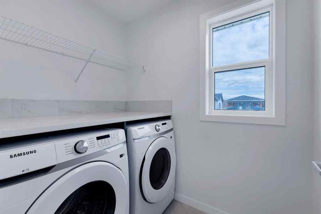 MLS® A2215565 - 143 Herron Walk NE in Livingston Calgary, Residential