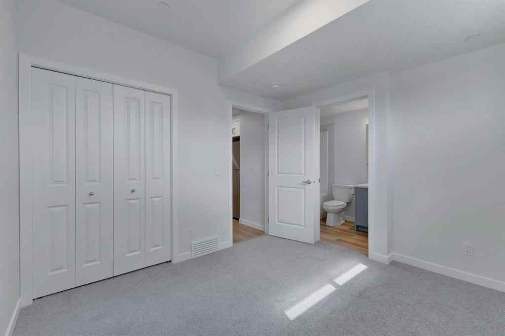 MLS® A2215565 - 143 Herron Walk NE in Livingston Calgary, Residential