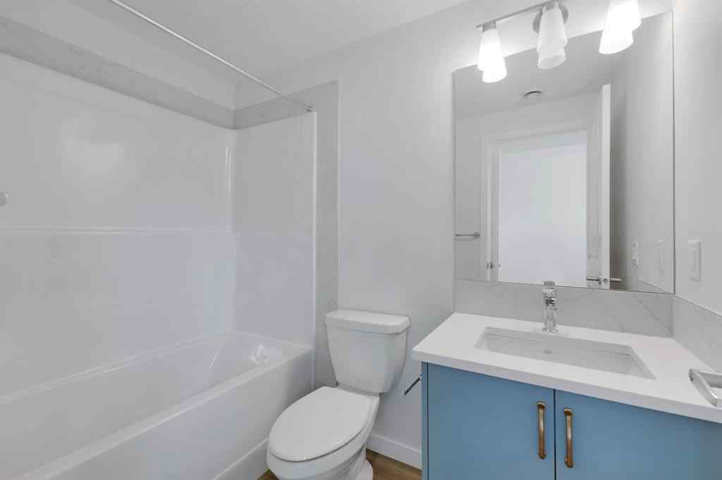 MLS® A2215565 - 143 Herron Walk NE in Livingston Calgary, Residential