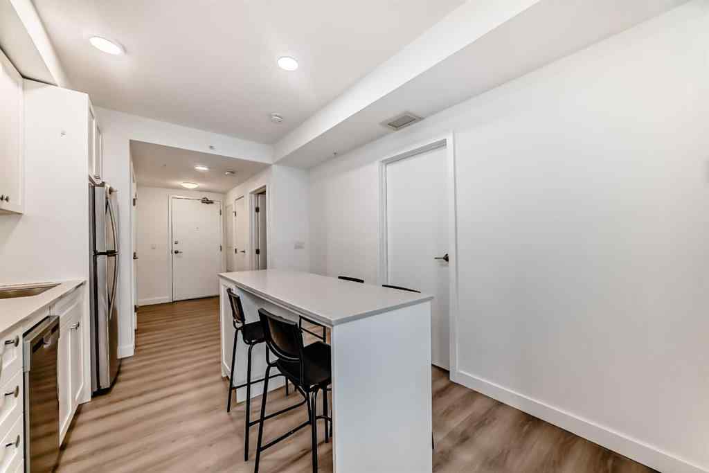MLS® A2215761 - Unit #503 123 4 Street NE in Crescent Heights Calgary, Residential
