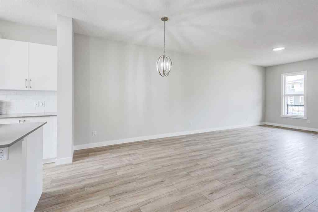 MLS® A2215819 - 166 Creekview Gardens SW in Pine Creek Calgary, Residential