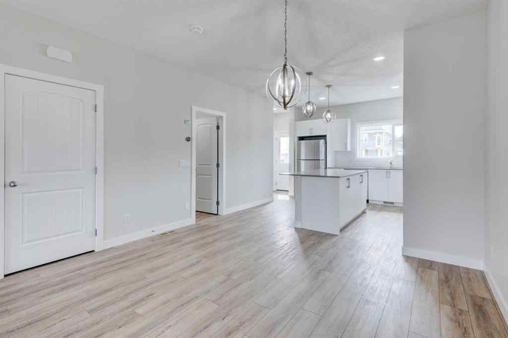 MLS® A2215819 - 166 Creekview Gardens SW in Pine Creek Calgary, Residential
