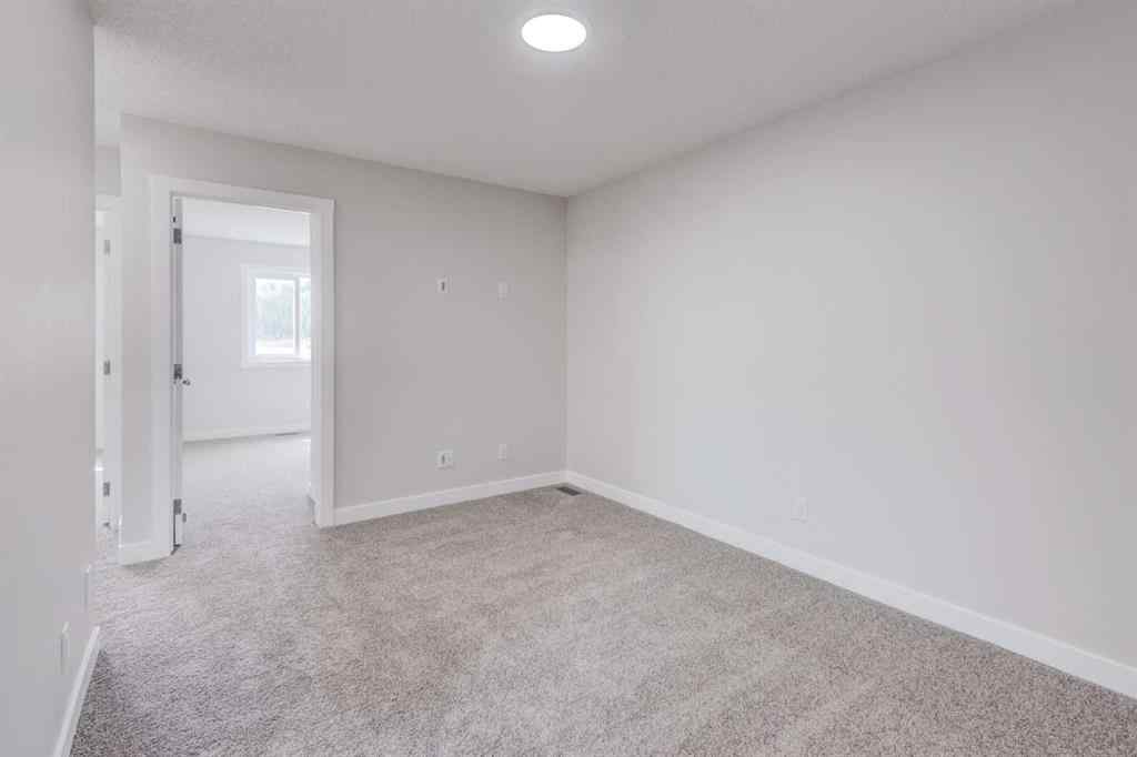 MLS® A2215819 - 166 Creekview Gardens SW in Pine Creek Calgary, Residential
