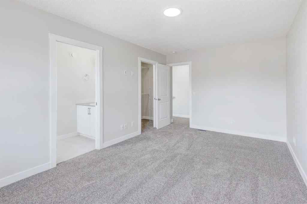 MLS® A2215819 - 166 Creekview Gardens SW in Pine Creek Calgary, Residential