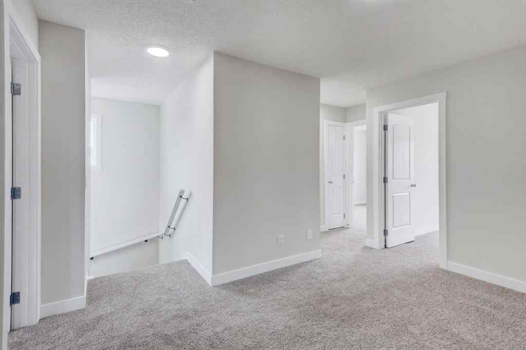 MLS® A2215819 - 166 Creekview Gardens SW in Pine Creek Calgary, Residential