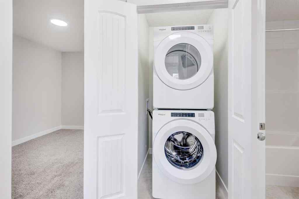 MLS® A2215819 - 166 Creekview Gardens SW in Pine Creek Calgary, Residential