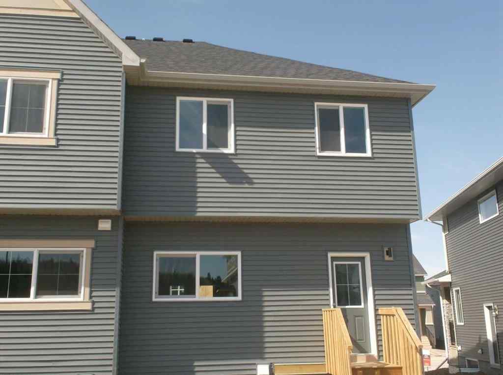 MLS® A2215819 - 166 Creekview Gardens SW in Pine Creek Calgary, Residential