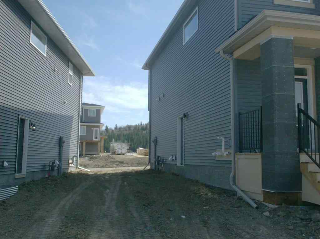 MLS® A2215819 - 166 Creekview Gardens SW in Pine Creek Calgary, Residential