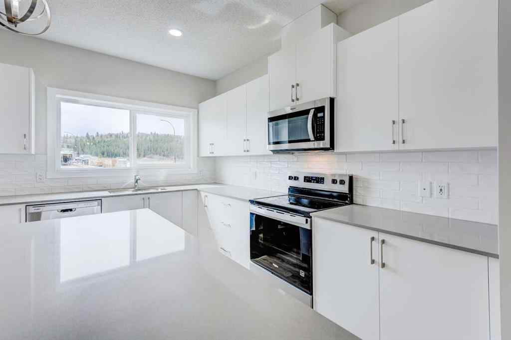 MLS® A2215819 - 166 Creekview Gardens SW in Pine Creek Calgary, Residential