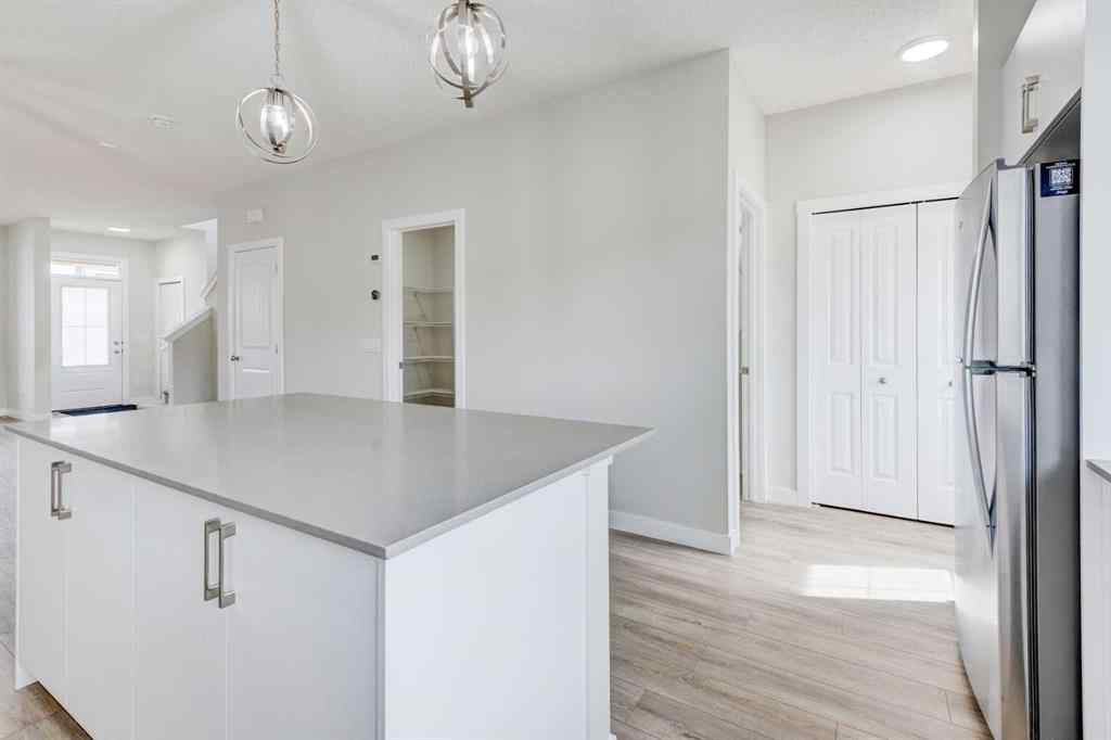 MLS® A2215819 - 166 Creekview Gardens SW in Pine Creek Calgary, Residential