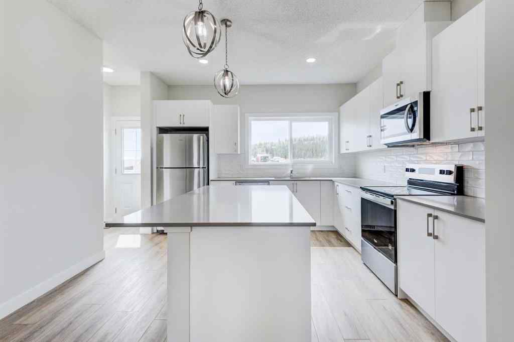 MLS® A2215819 - 166 Creekview Gardens SW in Pine Creek Calgary, Residential