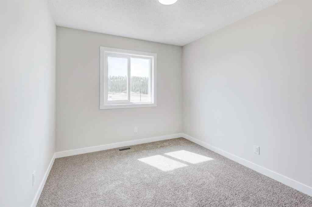 MLS® A2215819 - 166 Creekview Gardens SW in Pine Creek Calgary, Residential