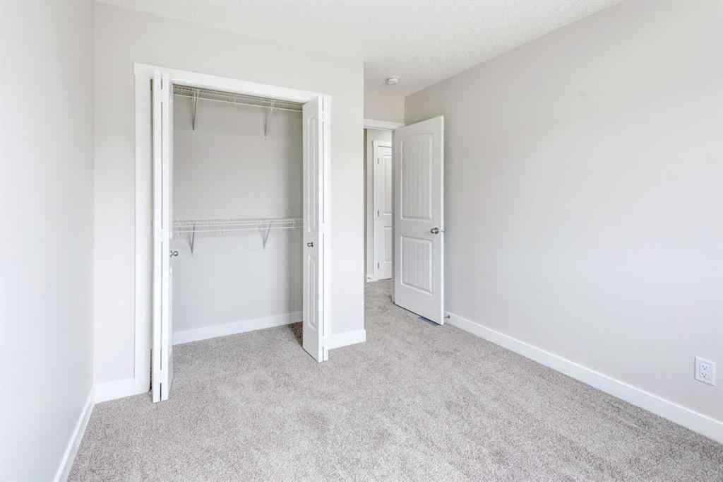 MLS® A2215819 - 166 Creekview Gardens SW in Pine Creek Calgary, Residential